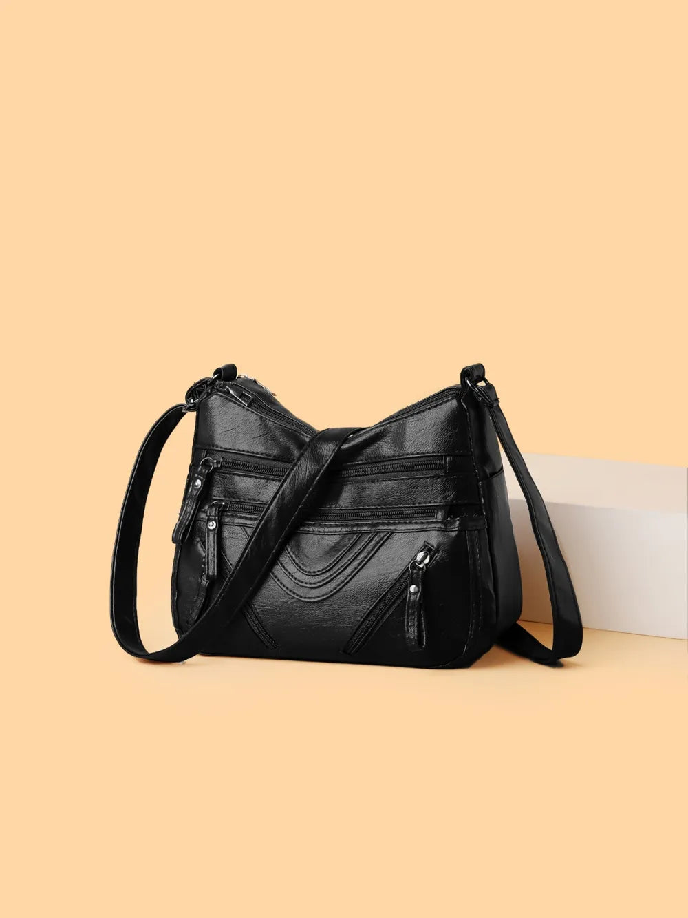 Sac bandoulière multi-compartiments