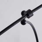 Arisha Arc Wall Lamp – Black & Gold Metal and Glass Sconce for Bedroom