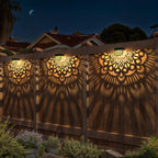 Solar mandala decorative wall light metal waterproof outdoor fence — installed on garden fence