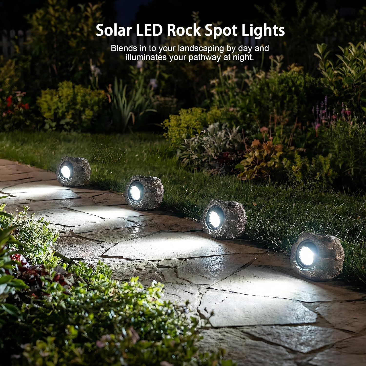 Solar rock garden lights decorative fake stone warm white outdoor — illuminated at night warm glow