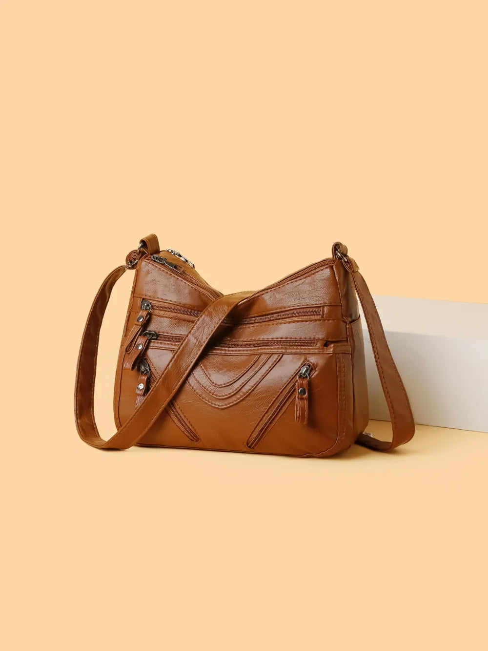 Sac bandoulière multi-compartiments