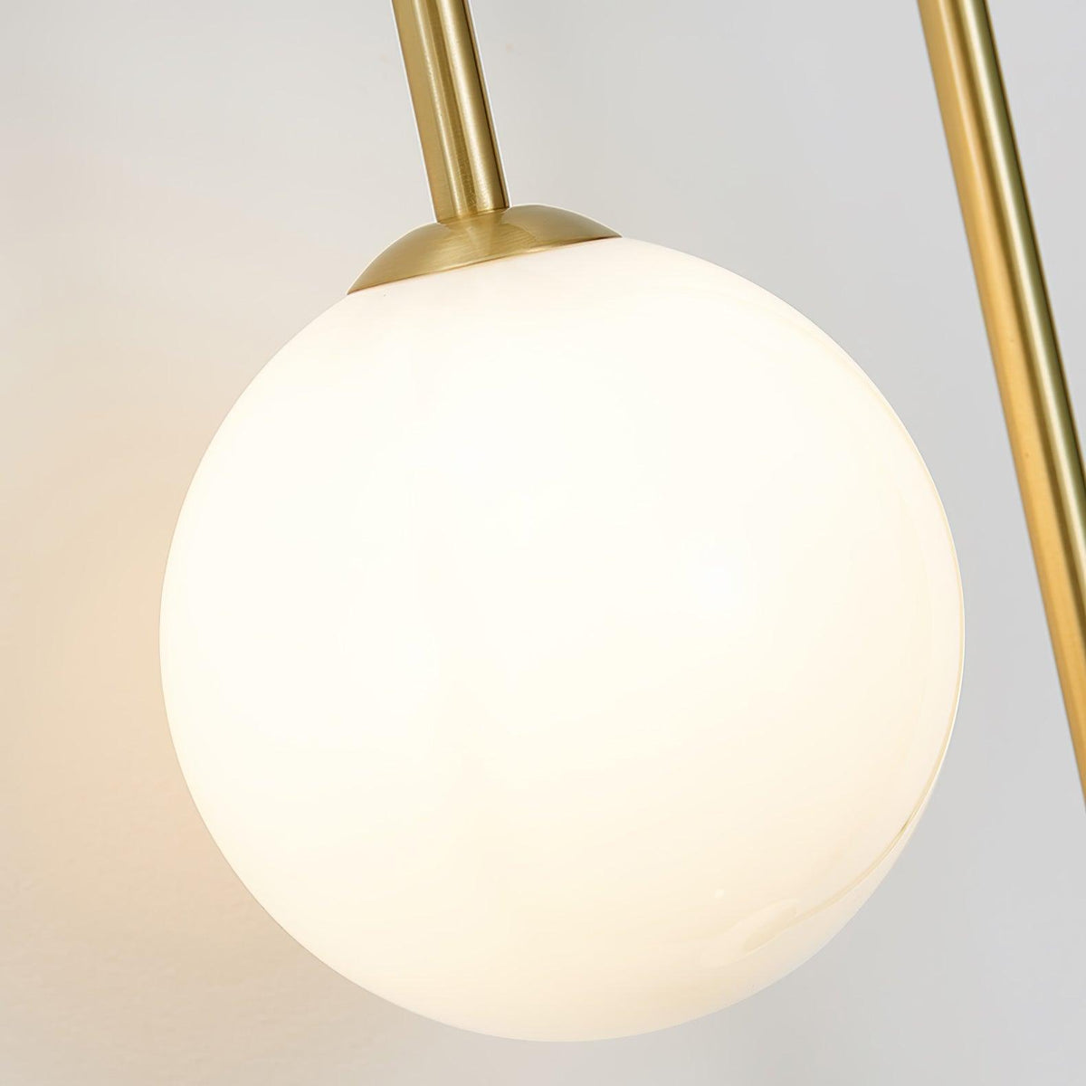 Elaro Elegant Brass Arc Wall Light – Modern Wall Sconce