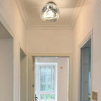 Auden Amber Glass Wall Lamp – Elegant Warm Glow Lighting for Stylish Interiors