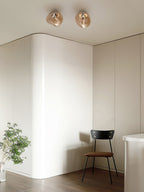 Auden Amber Glass Wall Lamp – Elegant Warm Glow Lighting for Stylish Interiors