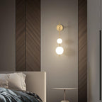 Cerin Vertical Globe Wall Lamp – Elegant Modern Lighting for Stylish Interiors
