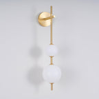 Cerin Vertical Globe Wall Lamp – Elegant Modern Lighting for Stylish Interiors
