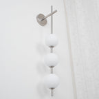 Cerin Vertical Globe Wall Lamp – Elegant Modern Lighting for Stylish Interiors