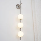 Cerin Vertical Globe Wall Lamp – Elegant Modern Lighting for Stylish Interiors