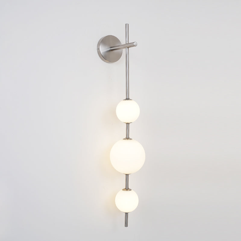 Cerin Vertical Globe Wall Lamp – Elegant Modern Lighting for Stylish Interiors