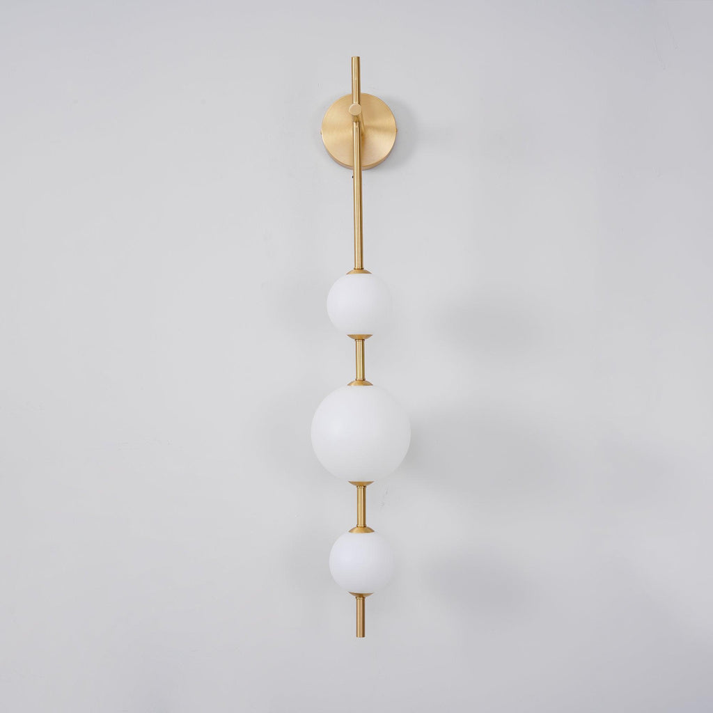 Cerin Vertical Globe Wall Lamp – Elegant Modern Lighting for Stylish Interiors