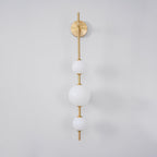 Cerin Vertical Globe Wall Lamp – Elegant Modern Lighting for Stylish Interiors
