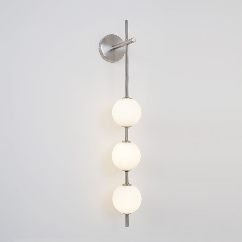 Cerin Vertical Globe Wall Lamp – Elegant Modern Lighting for Stylish Interiors