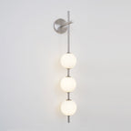 Cerin Vertical Globe Wall Lamp – Elegant Modern Lighting for Stylish Interiors