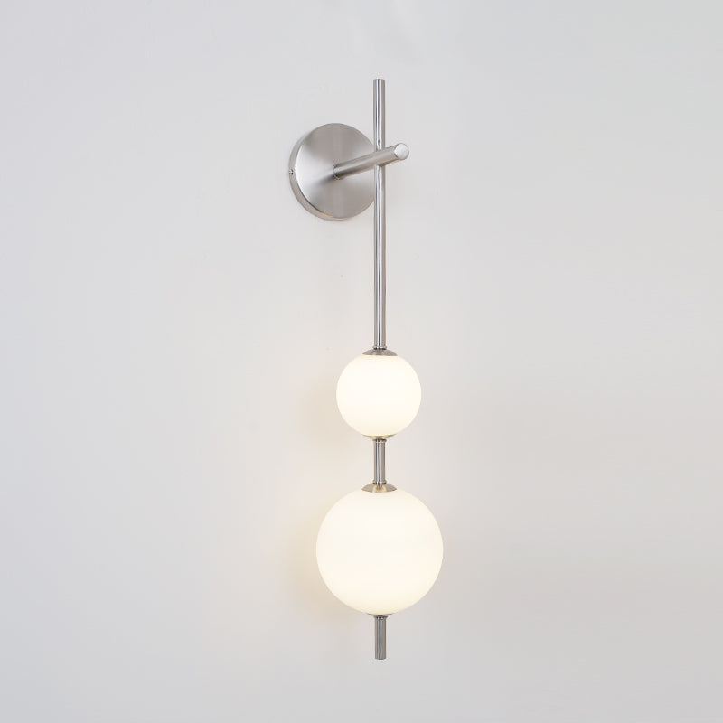 Cerin Vertical Globe Wall Lamp – Elegant Modern Lighting for Stylish Interiors