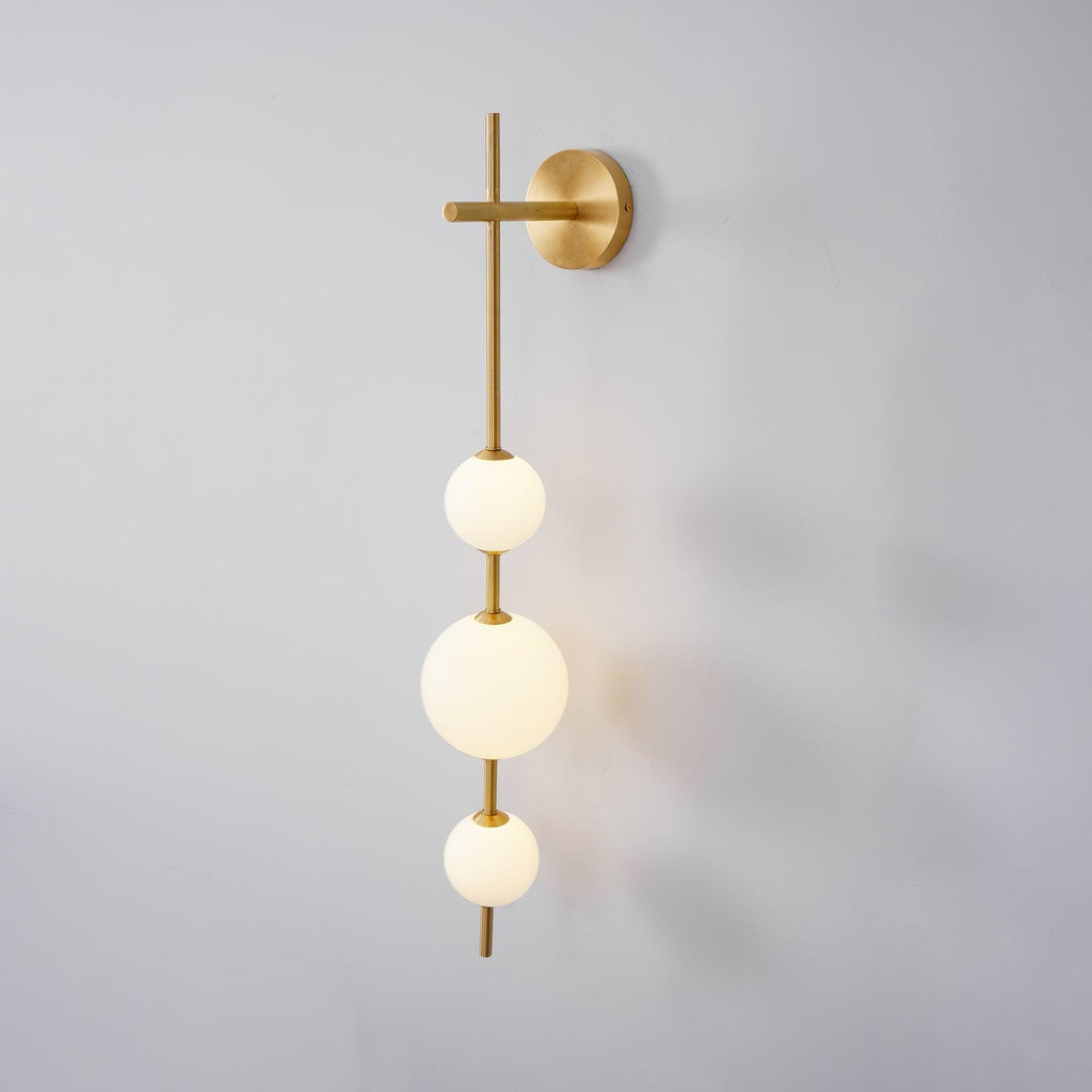 Cerin Vertical Globe Wall Lamp – Elegant Modern Lighting for Stylish Interiors