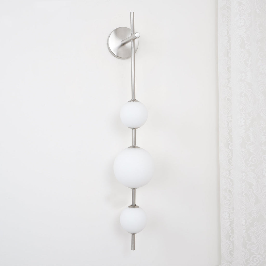 Cerin Vertical Globe Wall Lamp – Elegant Modern Lighting for Stylish Interiors