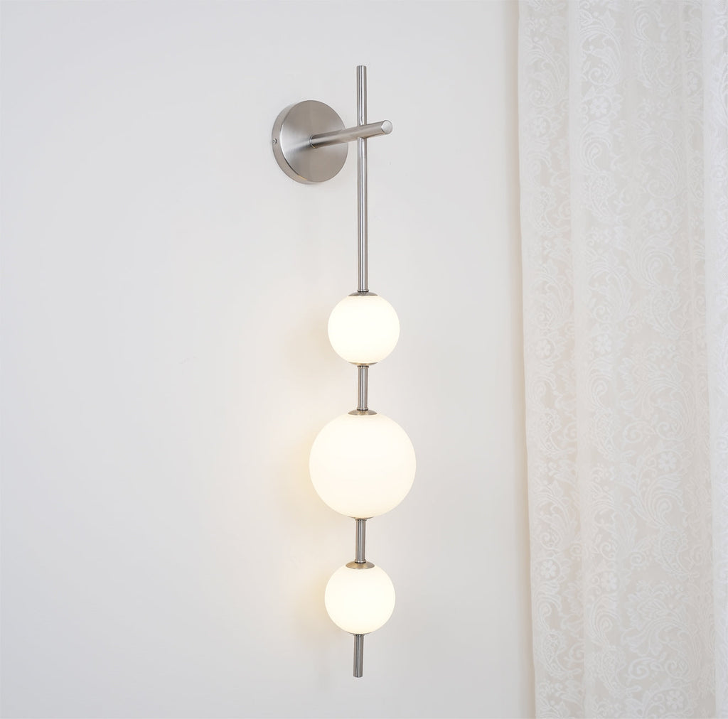 Cerin Vertical Globe Wall Lamp – Elegant Modern Lighting for Stylish Interiors