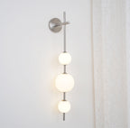 Cerin Vertical Globe Wall Lamp – Elegant Modern Lighting for Stylish Interiors