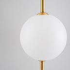 Cerin Vertical Globe Wall Lamp – Elegant Modern Lighting for Stylish Interiors