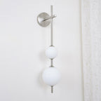 Cerin Vertical Globe Wall Lamp – Elegant Modern Lighting for Stylish Interiors