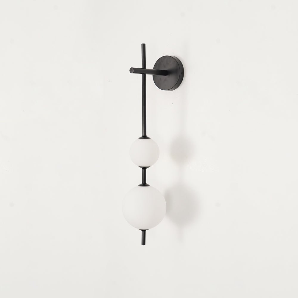 Cerin Vertical Globe Wall Lamp – Elegant Modern Lighting for Stylish Interiors