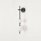 Cerin Vertical Globe Wall Lamp – Elegant Modern Lighting for Stylish Interiors