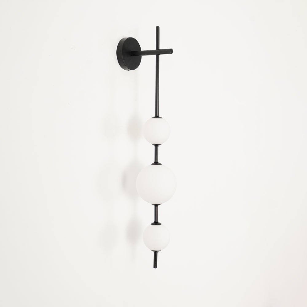 Cerin Vertical Globe Wall Lamp – Elegant Modern Lighting for Stylish Interiors