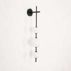 Cerin Vertical Globe Wall Lamp – Elegant Modern Lighting for Stylish Interiors