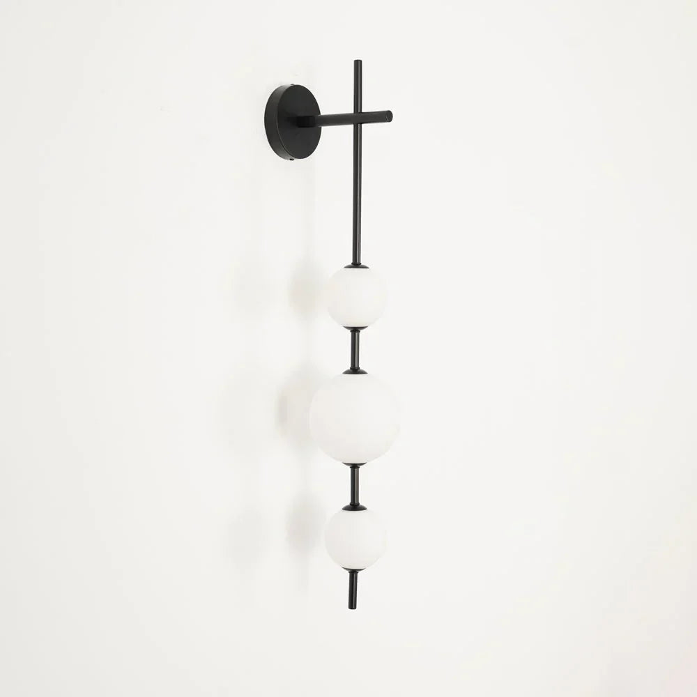 Cerin Vertical Globe Wall Lamp – Elegant Modern Lighting for Stylish Interiors