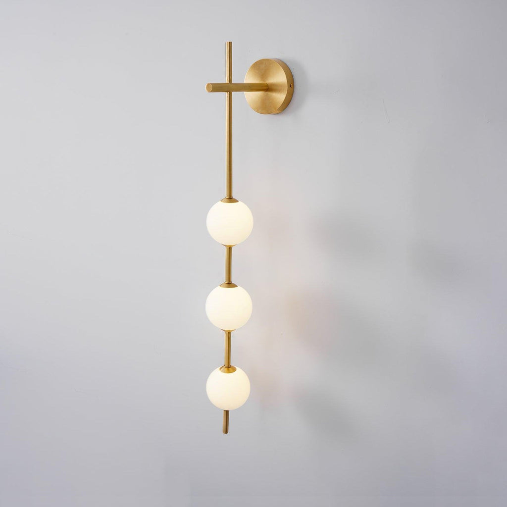 Cerin Vertical Globe Wall Lamp – Elegant Modern Lighting for Stylish Interiors