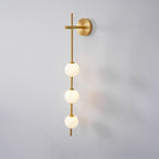 Cerin Vertical Globe Wall Lamp – Elegant Modern Lighting for Stylish Interiors