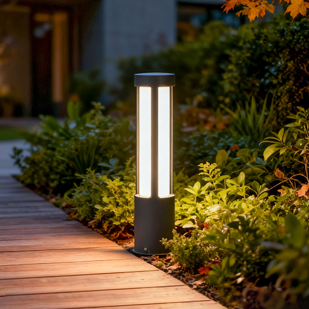 Residential bollard lights modern cylindrical LED landscape pathway — deck walkway night