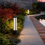 Residential bollard lights modern cylindrical LED landscape pathway — pathway landscape view