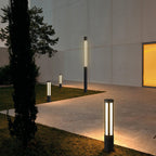 Residential bollard lights modern cylindrical LED landscape pathway — solar eco-friendly
