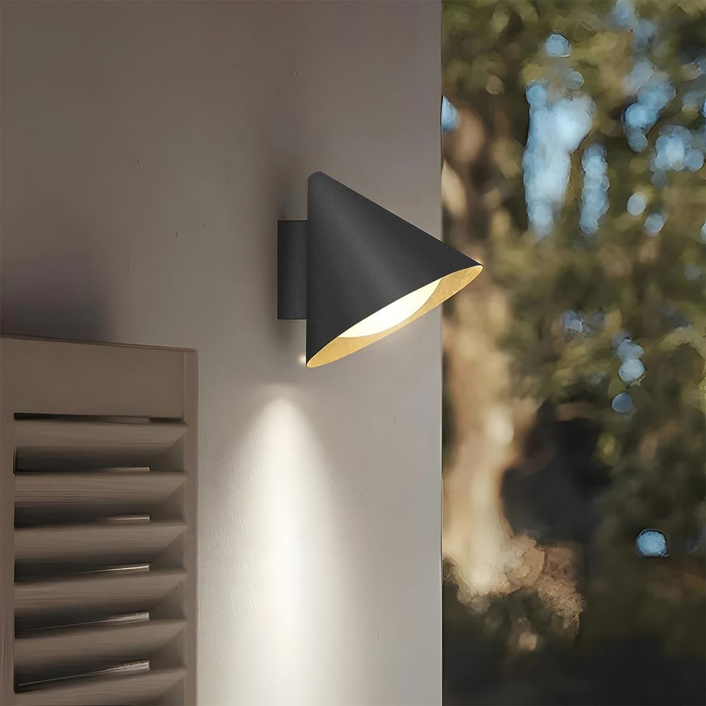 Close-up of Suzu Bell sconce showing the metal and acrylic bell shade construction